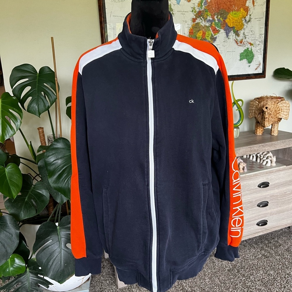 Calvin Klein Navy Blue Jacket with Orange Sleeves & White Accents